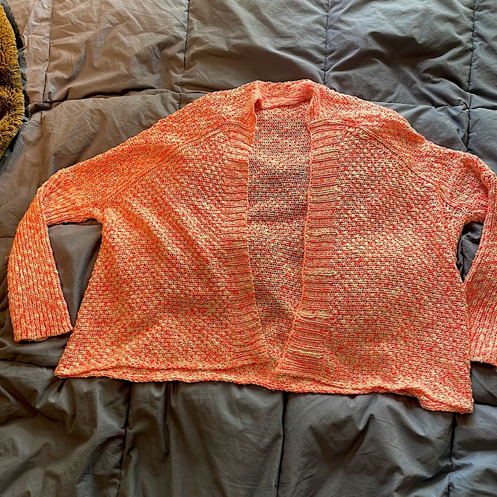 Size small neon pink and white cardigan.